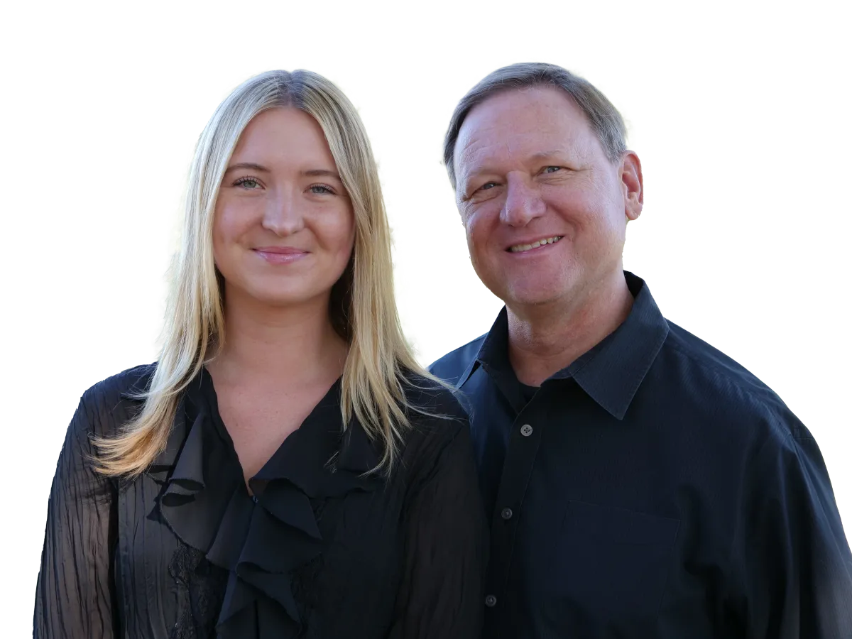 Real estate specialist Devin standing in a luxurious coastal setting, showcasing expertise in luxury homes in Southern California.