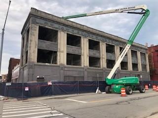 Boom lift at 2900 Cass during abatement work in Detroit