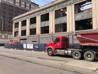 2900 Cass masonry façade during inspection with fencing in place