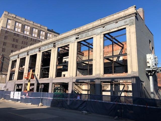 Stabilized façade of 2900 Cass with steel bracing