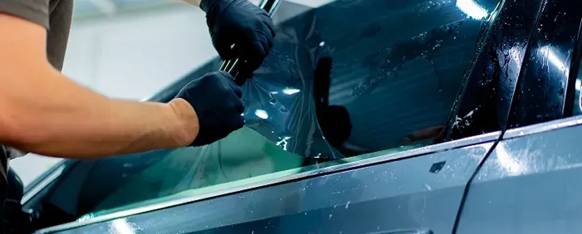 Front view of a BMW 325, showcasing the windshield for mobile auto glass repair in Miami, FL
