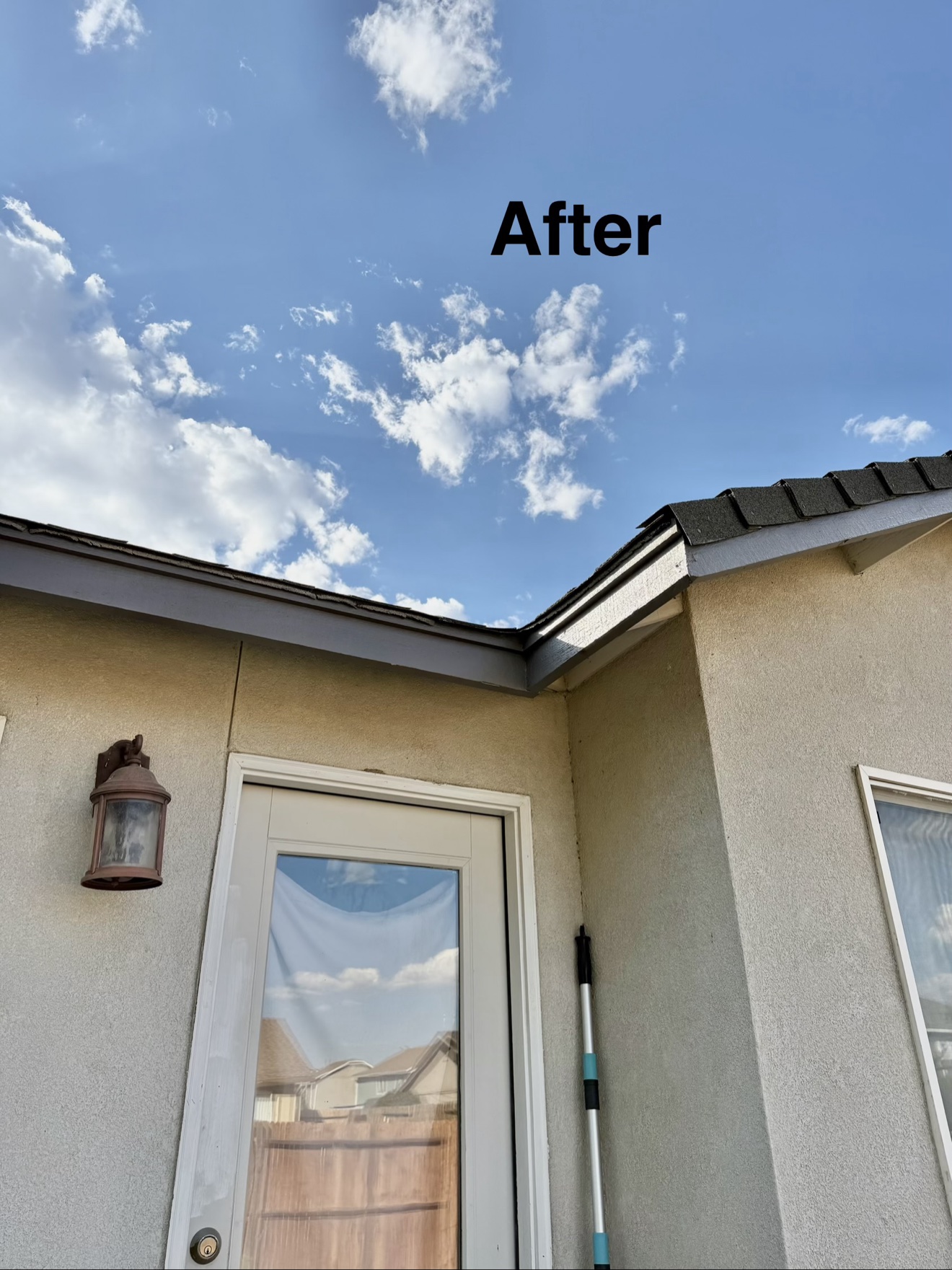 Freshly painted eave corner after repainting