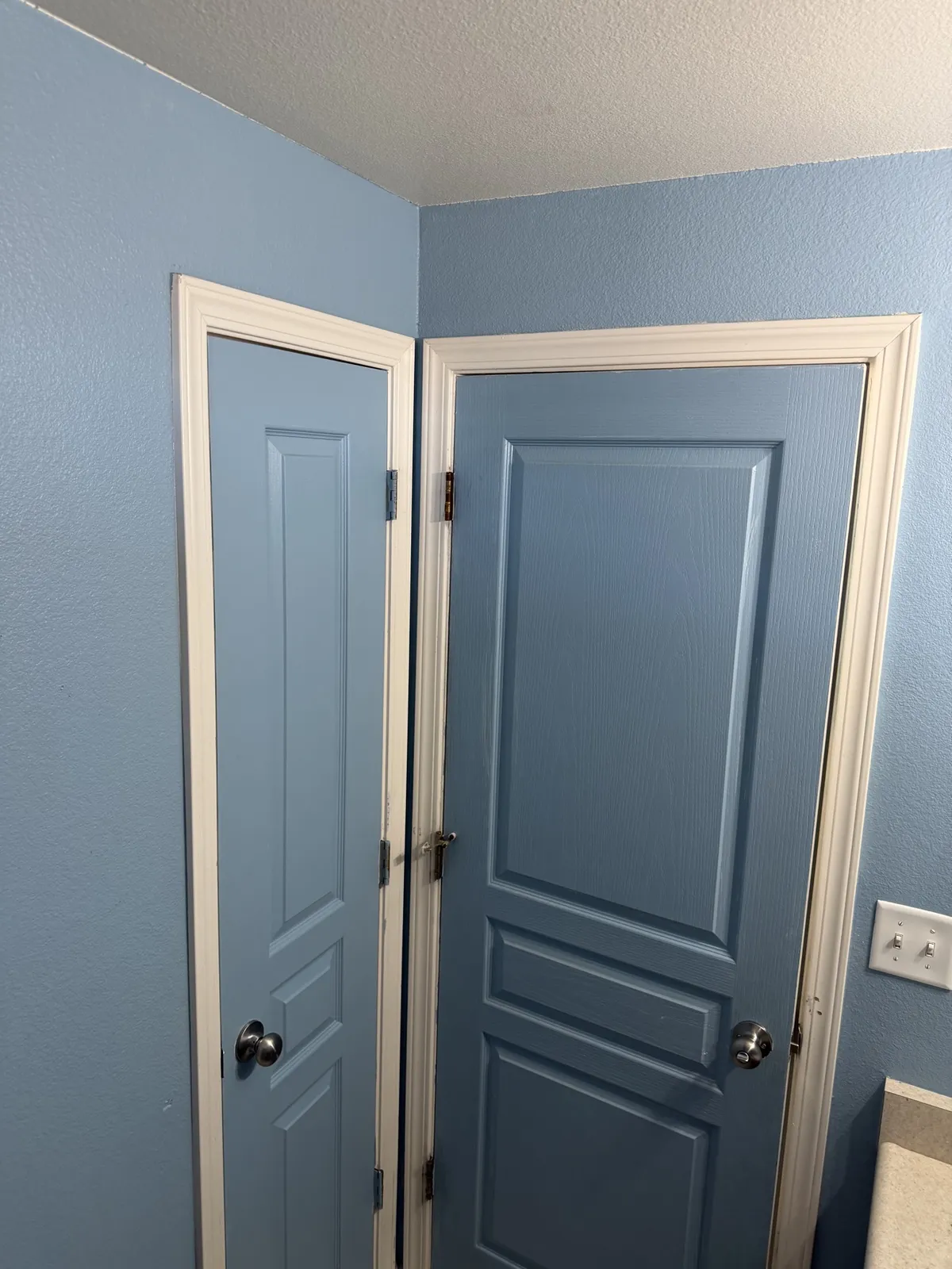 Interior detail — painted doors, crisp white trim