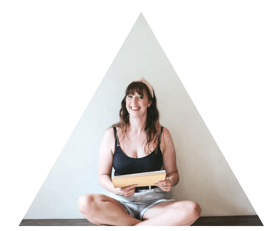 Picture of Jo McMeechan in a triangle - white female wearing a black vest top and shorts