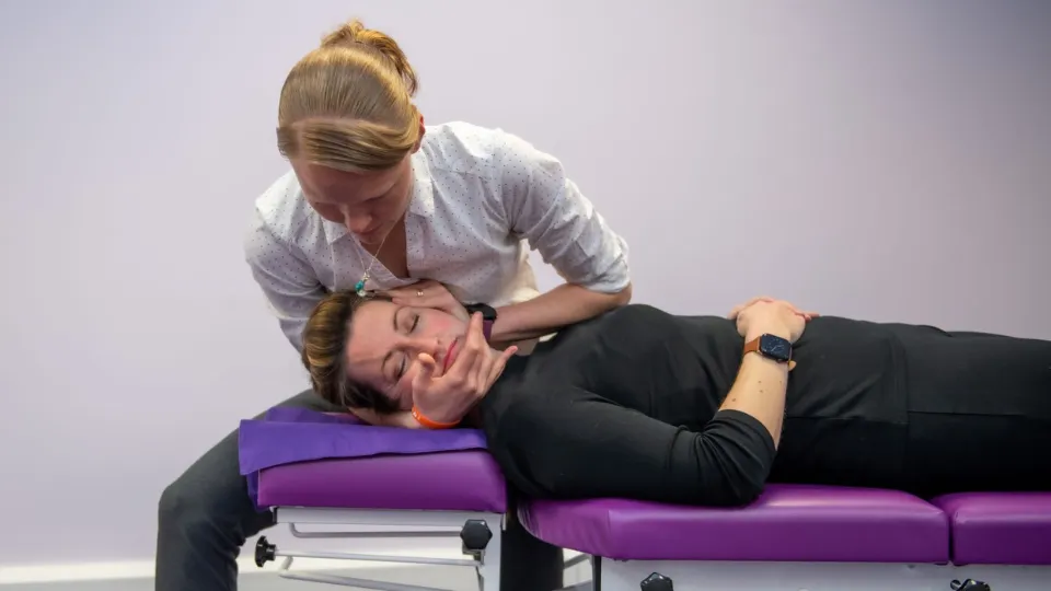 Chiropractor adjusting 