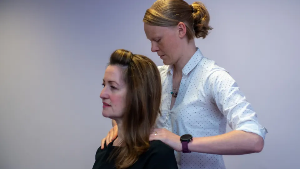 Chiropractor with patient