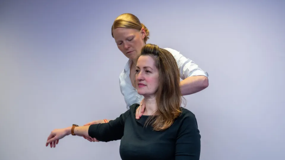 Chiropractor with patient