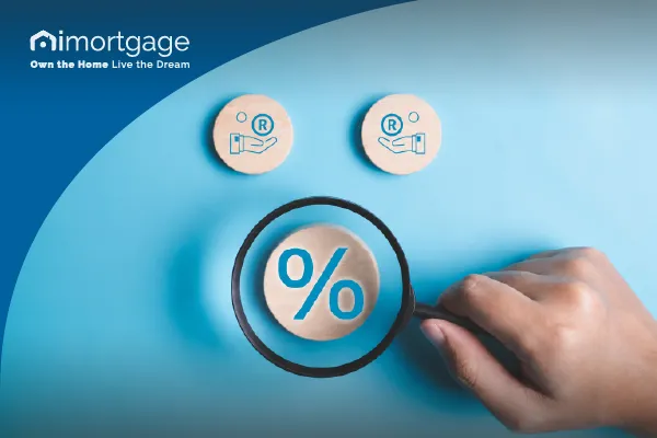 iMortgage graphic showing a magnifying glass over a percentage symbol, representing home loan interest rates