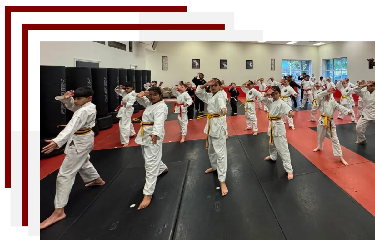 Instructor teaching children martial arts