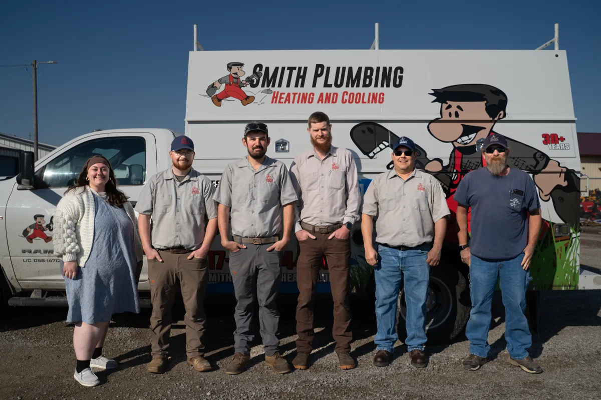 HVAC heating and cooling technician servicing equipment