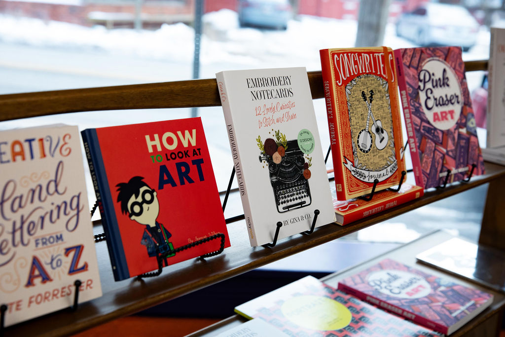 a photo of bookselections on a shelf at IRiS Art Haus