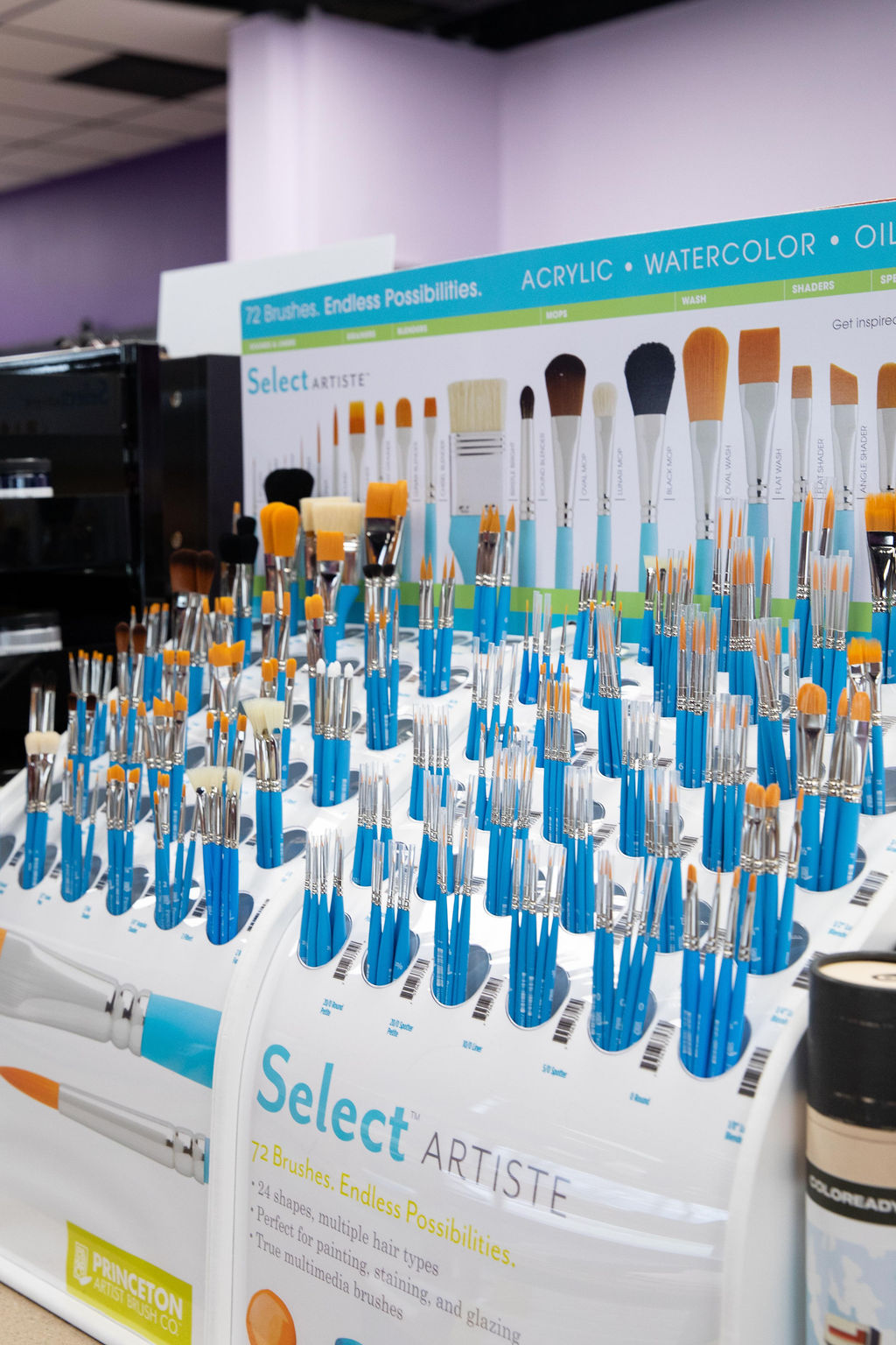 a photo of brush selections on a shelf at IRiS Art Haus