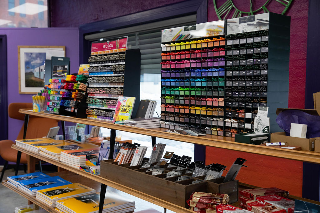 a photo of art supplies on a shelf at IRiS Art Haus