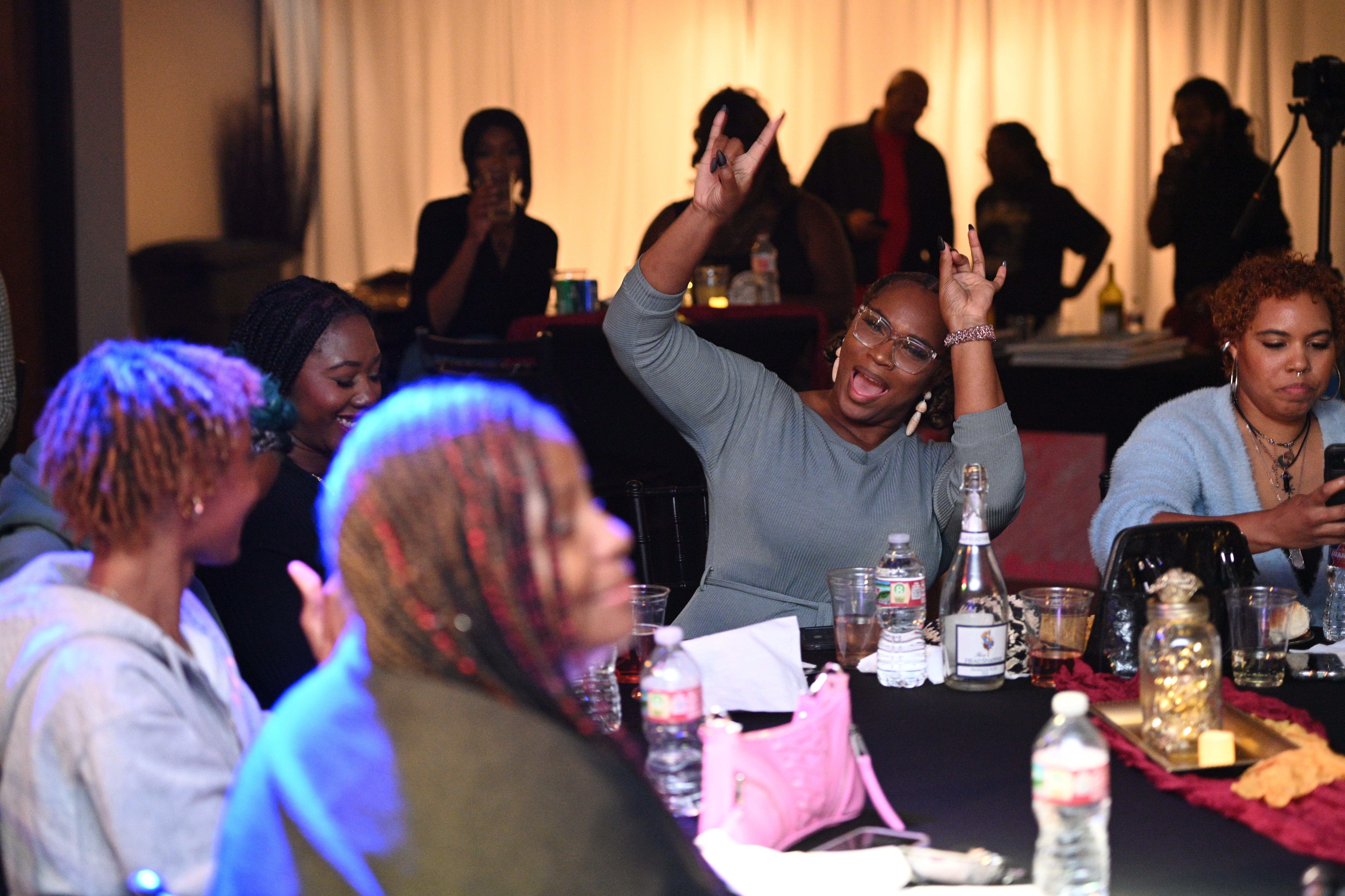 a pair of headphones sitting on top of a stand