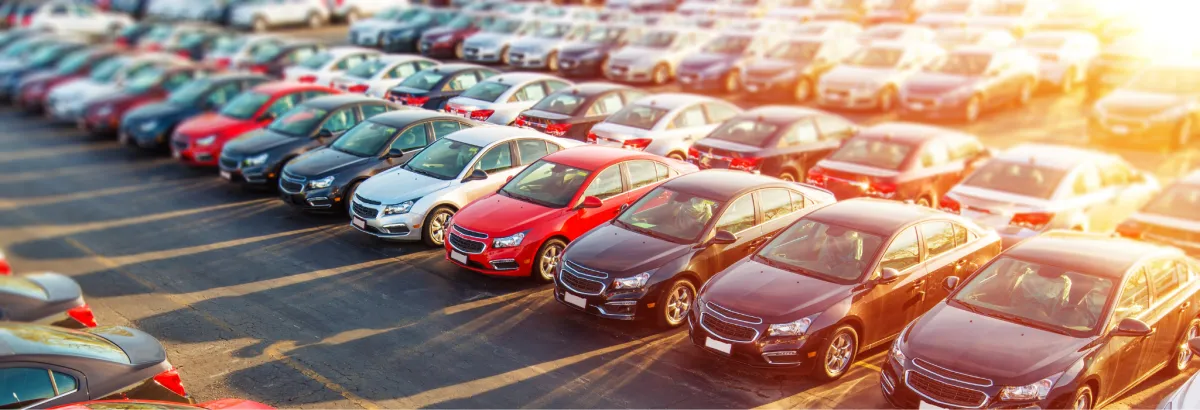 cars in a parking lot at sunset