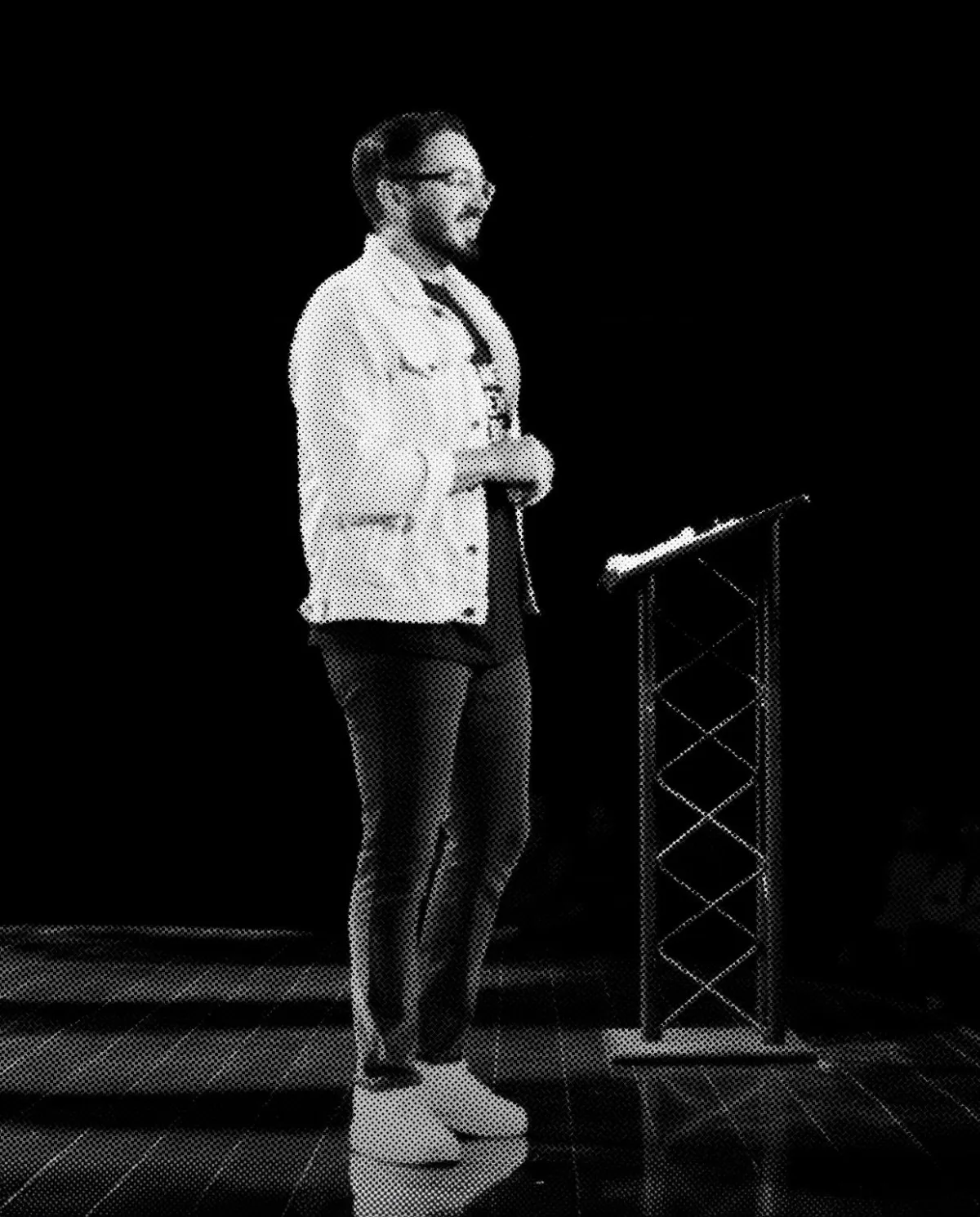 Speaker presenting at a podium in a church setting, emphasizing digital outreach and community connection.