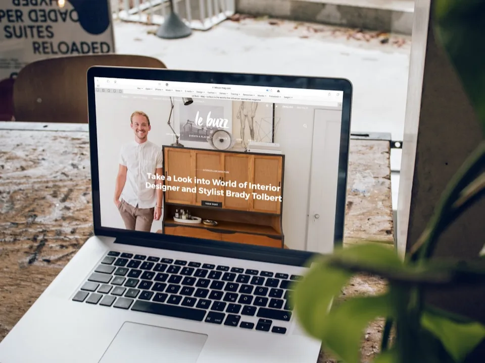 Person browsing a business website on a laptop, illustrating how users interact with websites before making decisions.