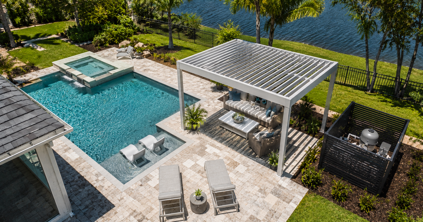 Aluminum pergola positioned beside a pool deck in Northwest Florida, illustrating footing and equipment clearance planning.