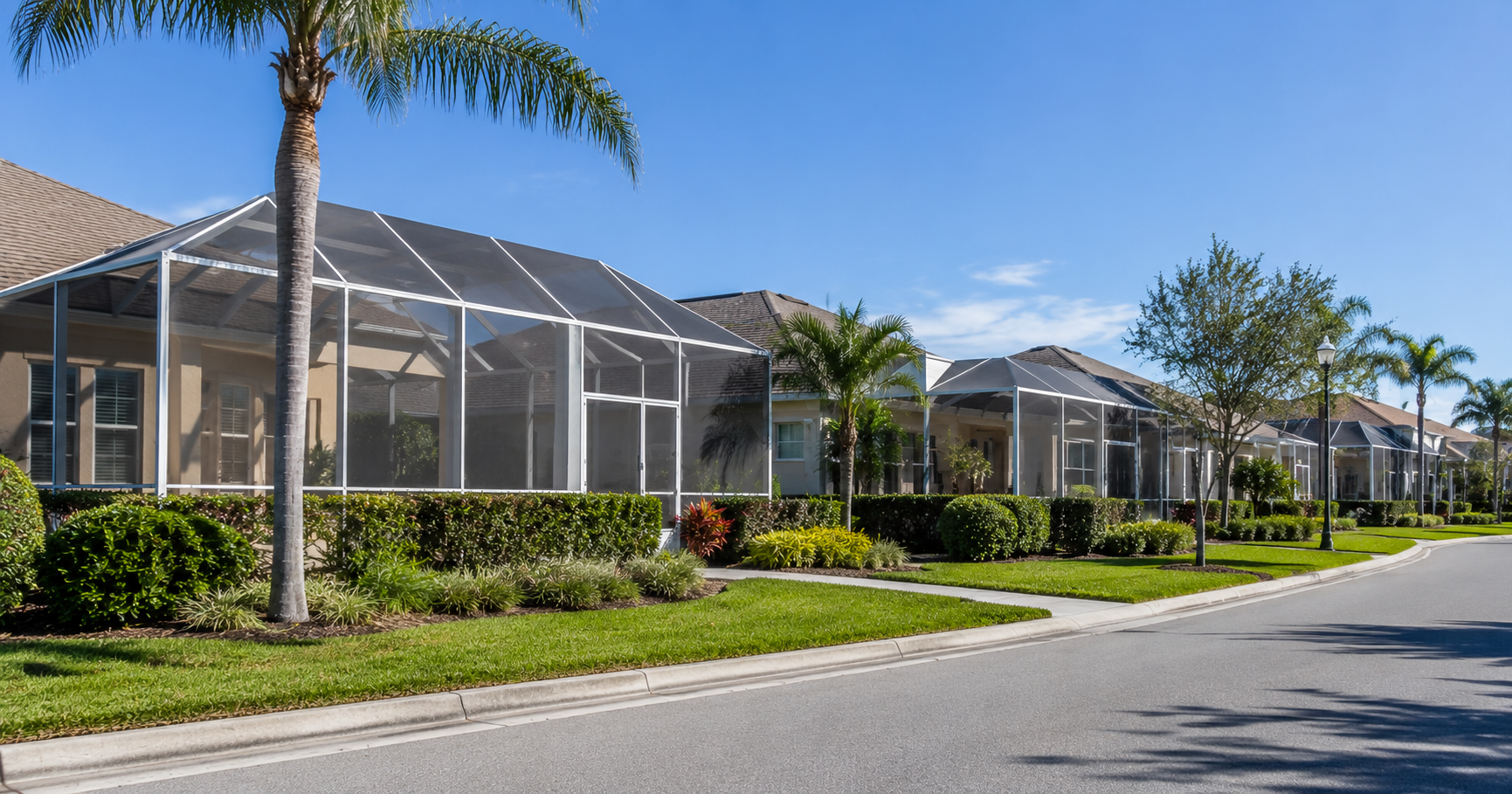 Northwest Florida HOA community with a pool enclosure matching community architectural standards.