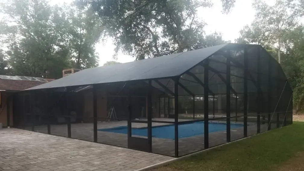 Bronze faceted dome screen enclosure built from straight aluminum segments by Aluminum Building Systems in Santa Rosa Beach, FL