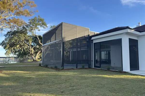 Screened pool enclosure built by Aluminum Building Systems, ready for the next hurricane season in the Florida Panhandle