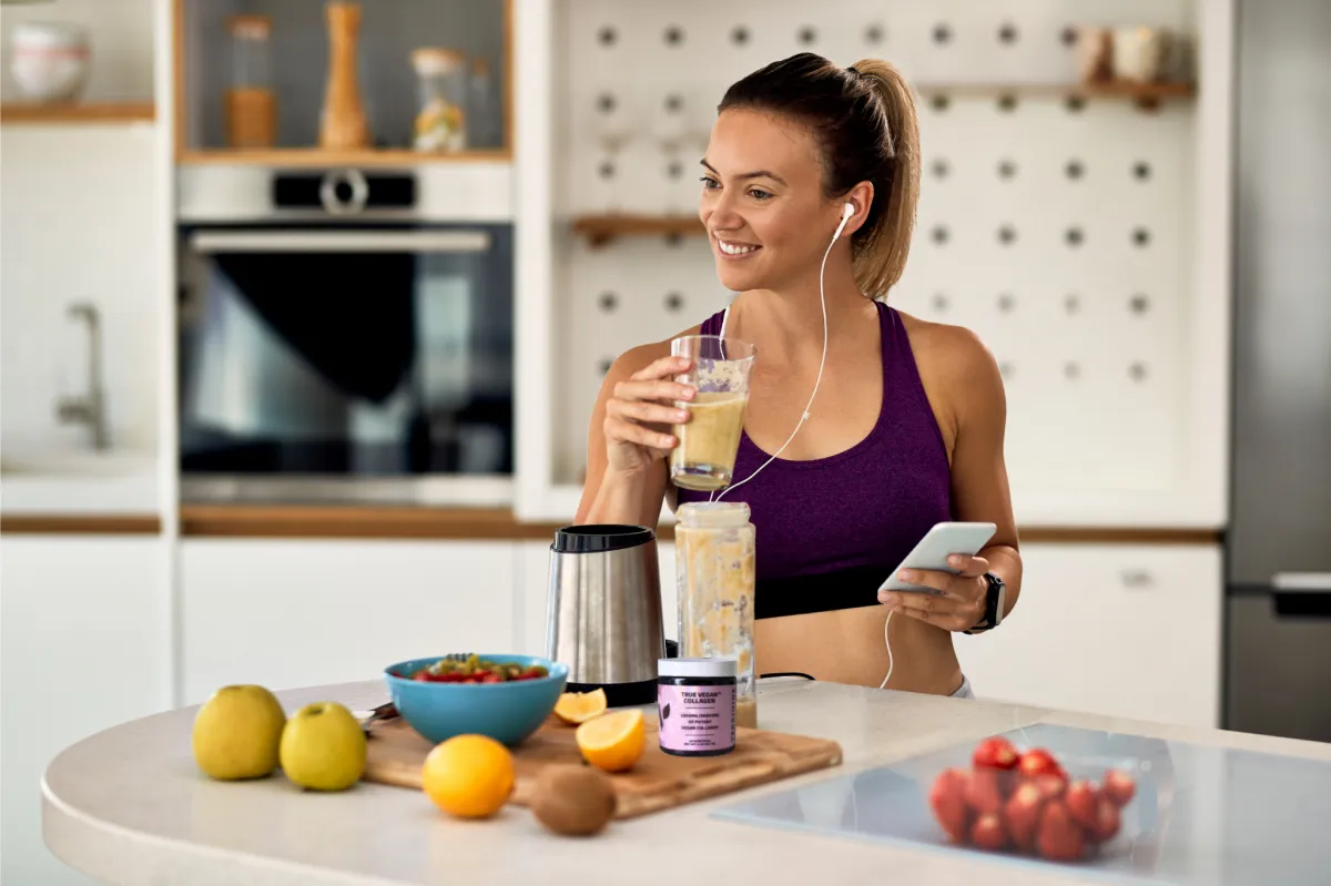 Lady making a shake with Veggimins Vegan Collagen