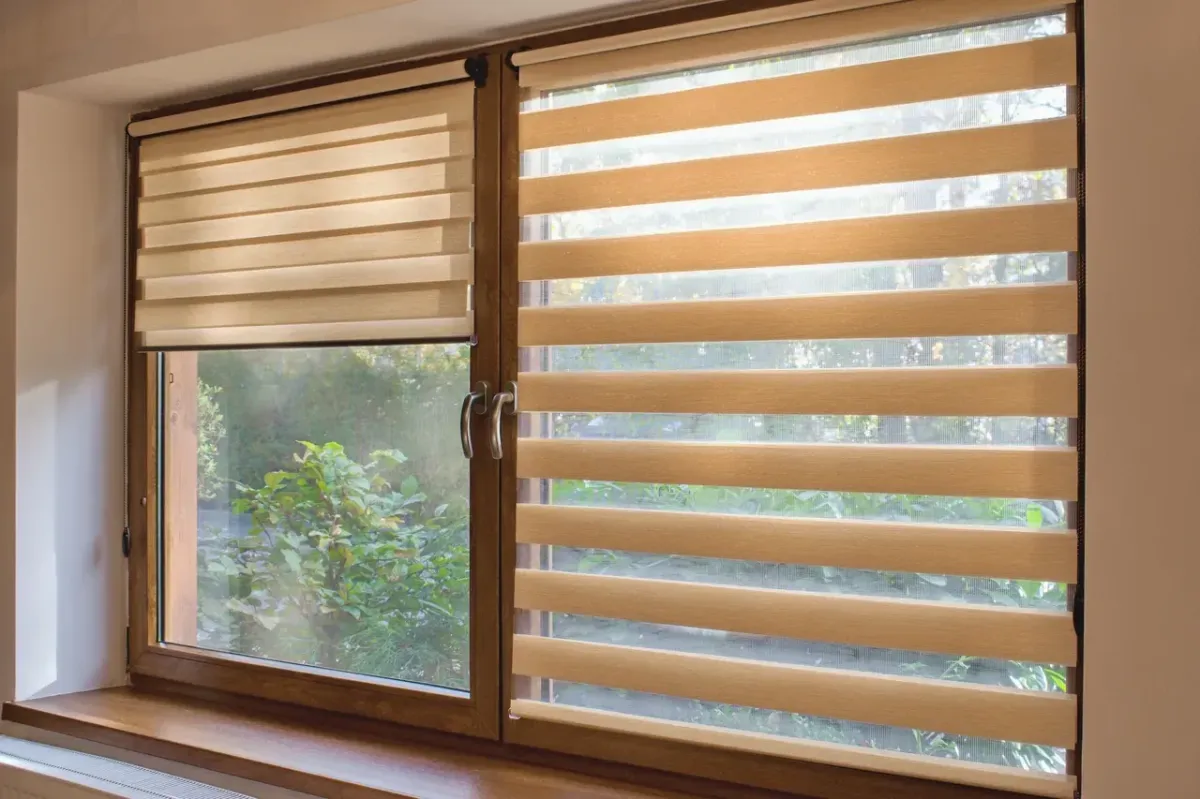 custom roller window shades installation by Designs By Francisco LLC