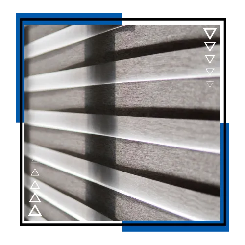 Modern zebra shades in a bright living room in Stuart, FL with soft filtered sunlight.