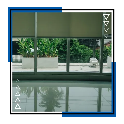 Custom roller shades adding privacy in a Palm Beach Gardens, FL bedroom