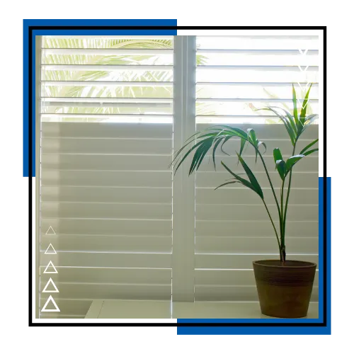 Interior shutters with clean window design in a Palm Beach Gardens home