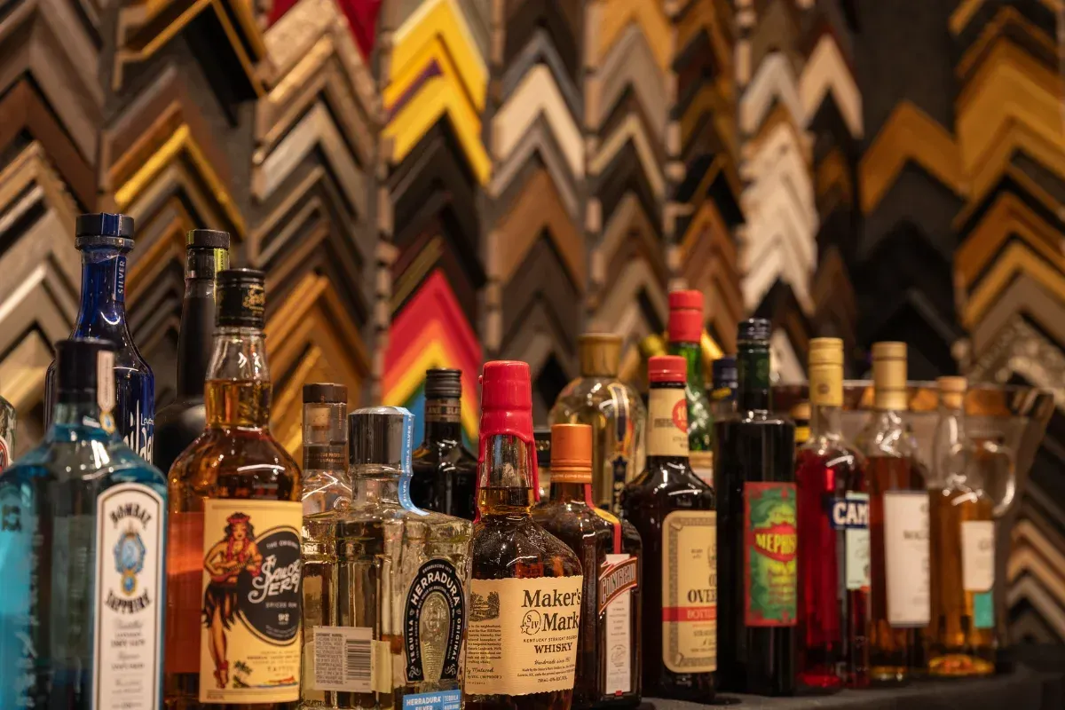 Bars on Wheels premium liquor selection displayed at stylish event mobile bar setup