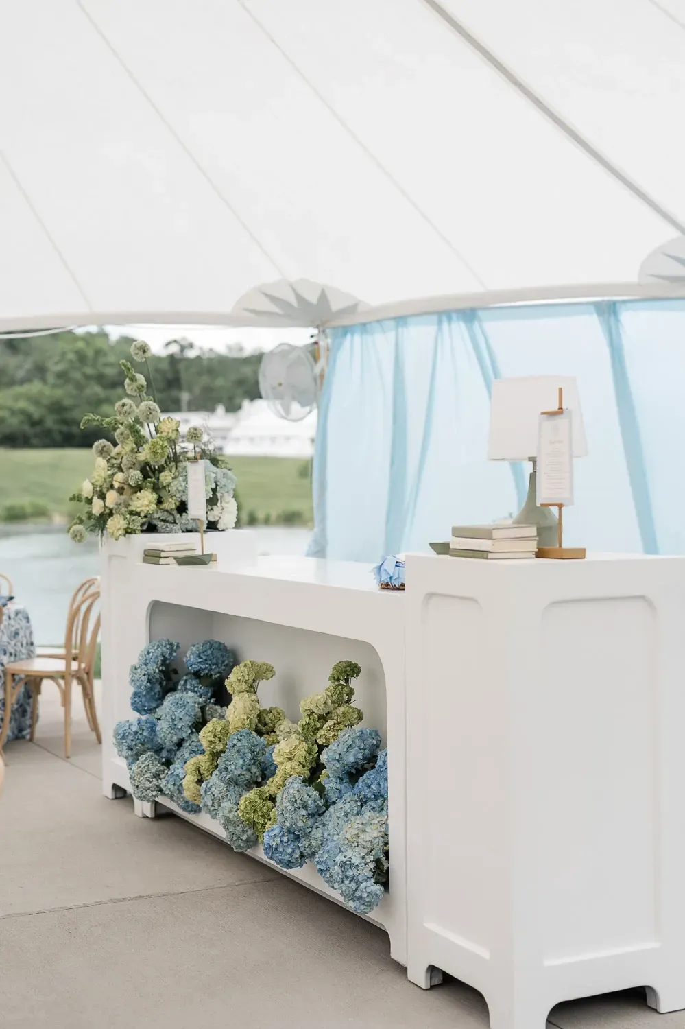 Bars on Wheels outdoor event bar setup with drink stations and floral decor for elegant wedding reception