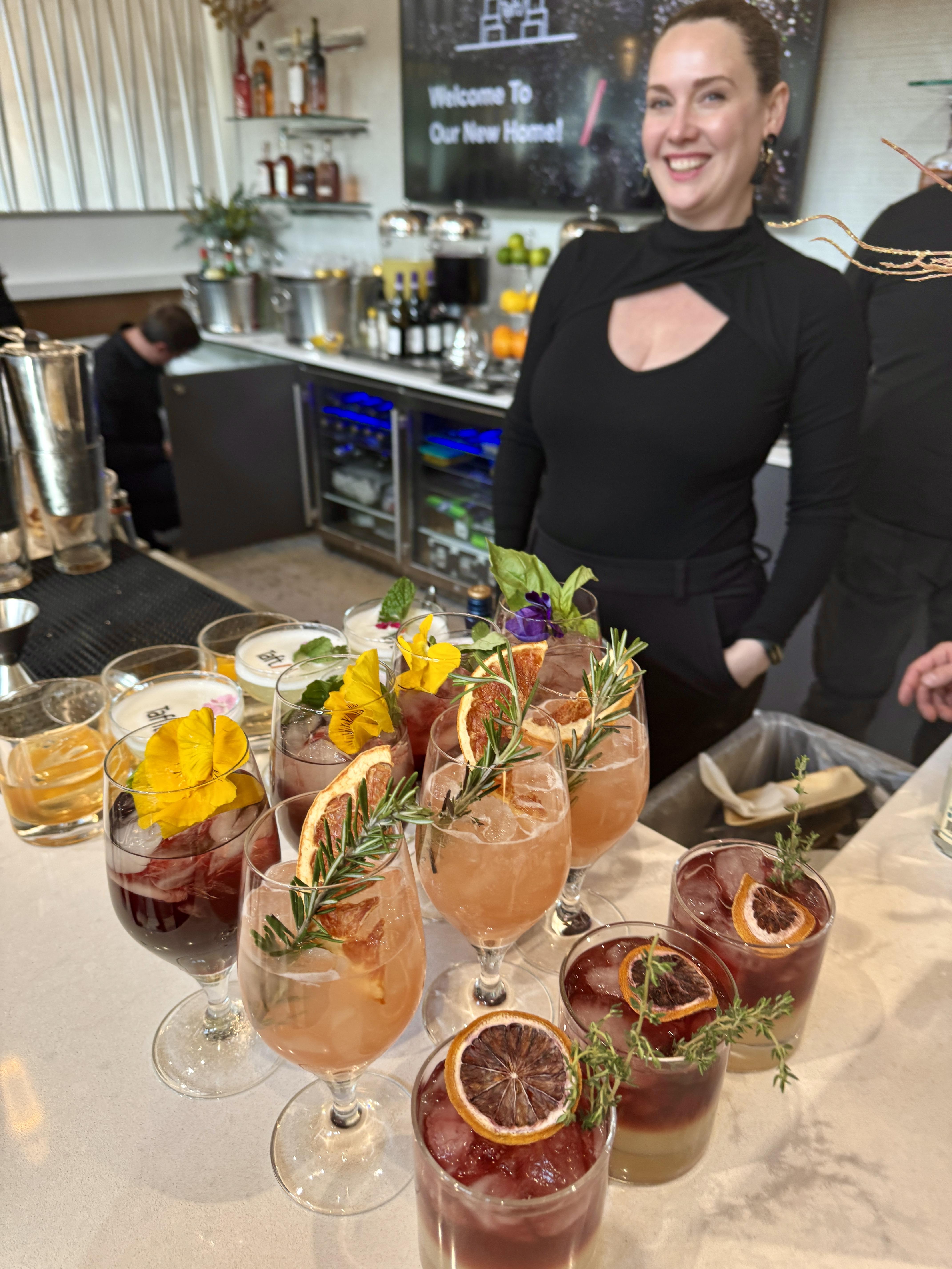Bars on Wheels bartender pouring champagne cocktails at stylish private party drink station