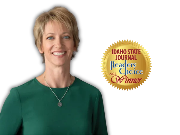 A foggy field with trees in the distance