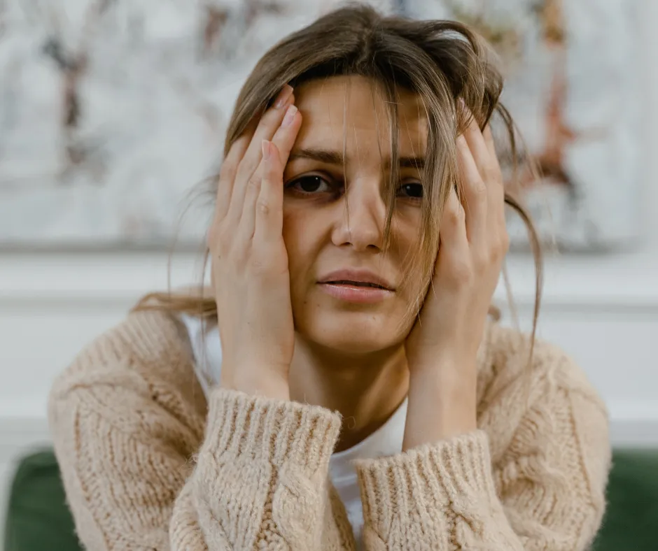 Calm and reflective woman journaling