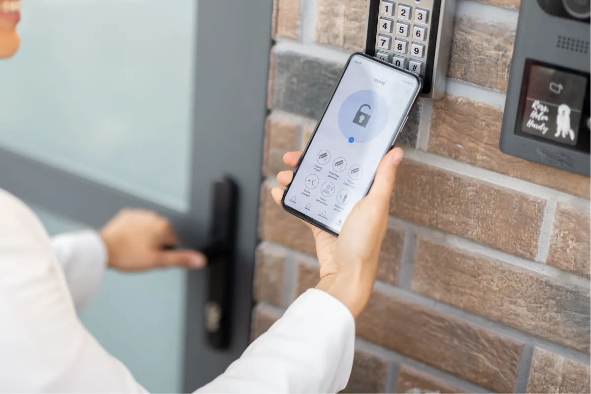 Woman Using Smartphone to Access Electronic Lock