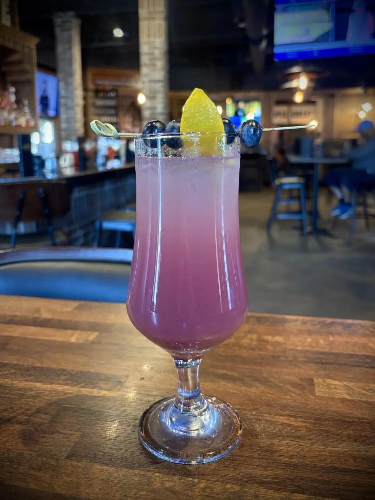 Floral lavender and citrus mocktail with blueberry, infused with adaptogens for a gentle energy lift and balance.