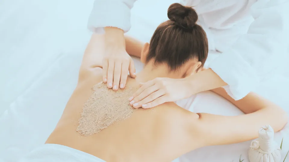 A woman getting Red Light Therapy with an eye mask on.