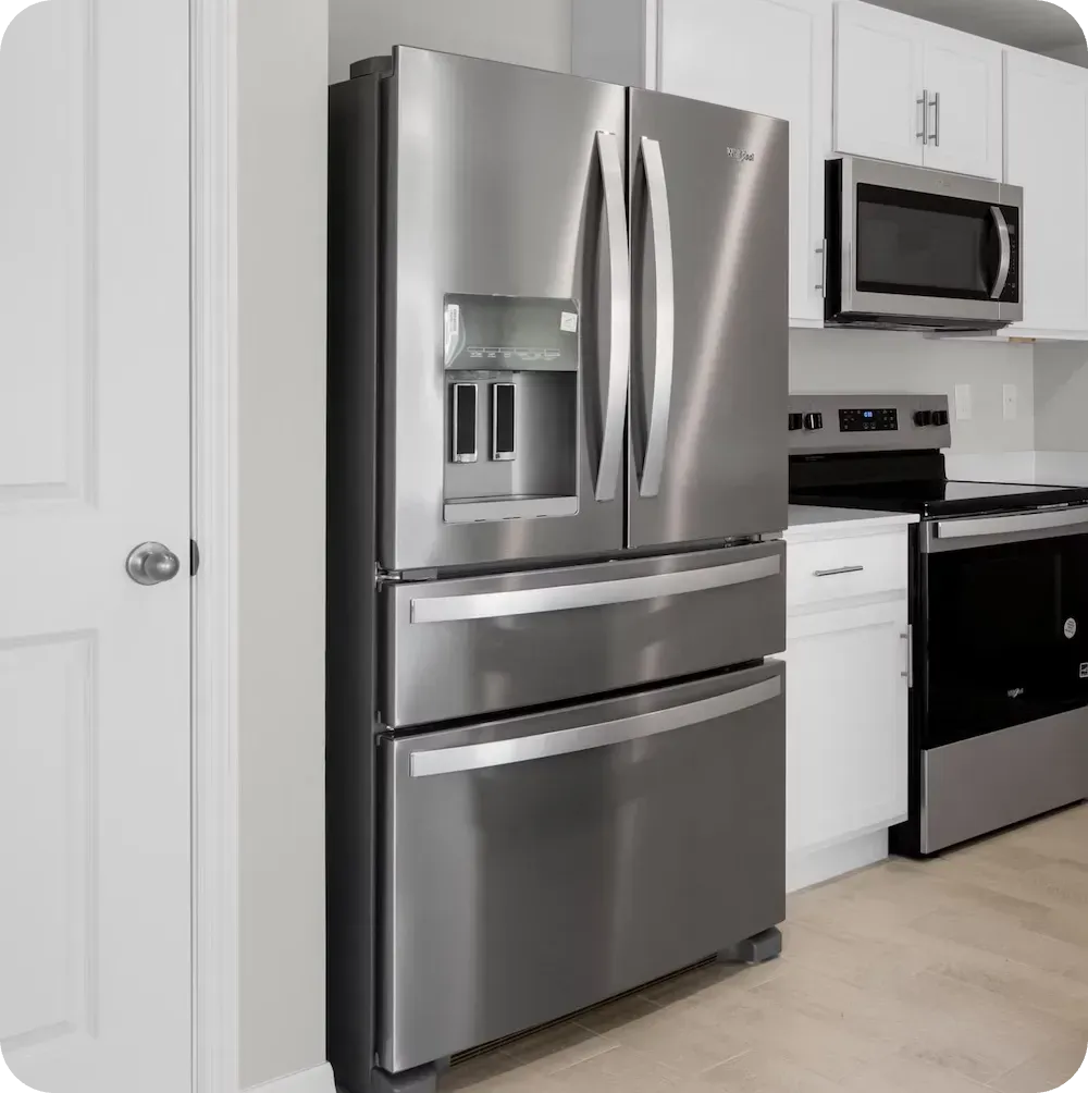 Double-door refrigerator in a Denver kitchen — Fix Master refrigerator repair
