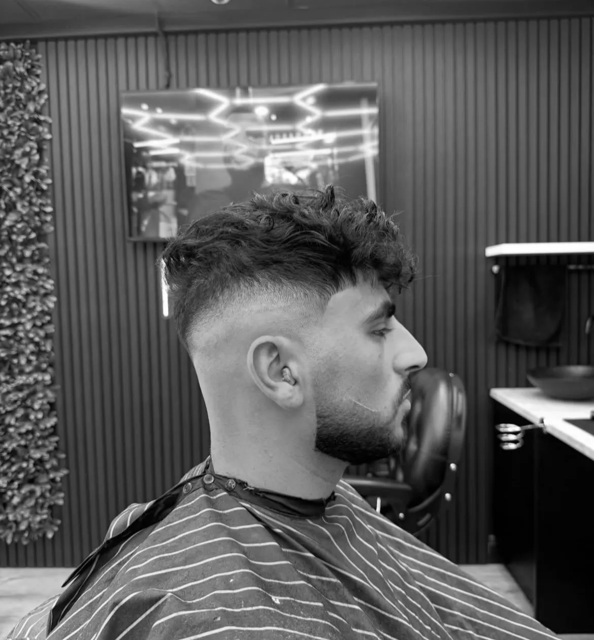 Textured crop hairstyle in black and white