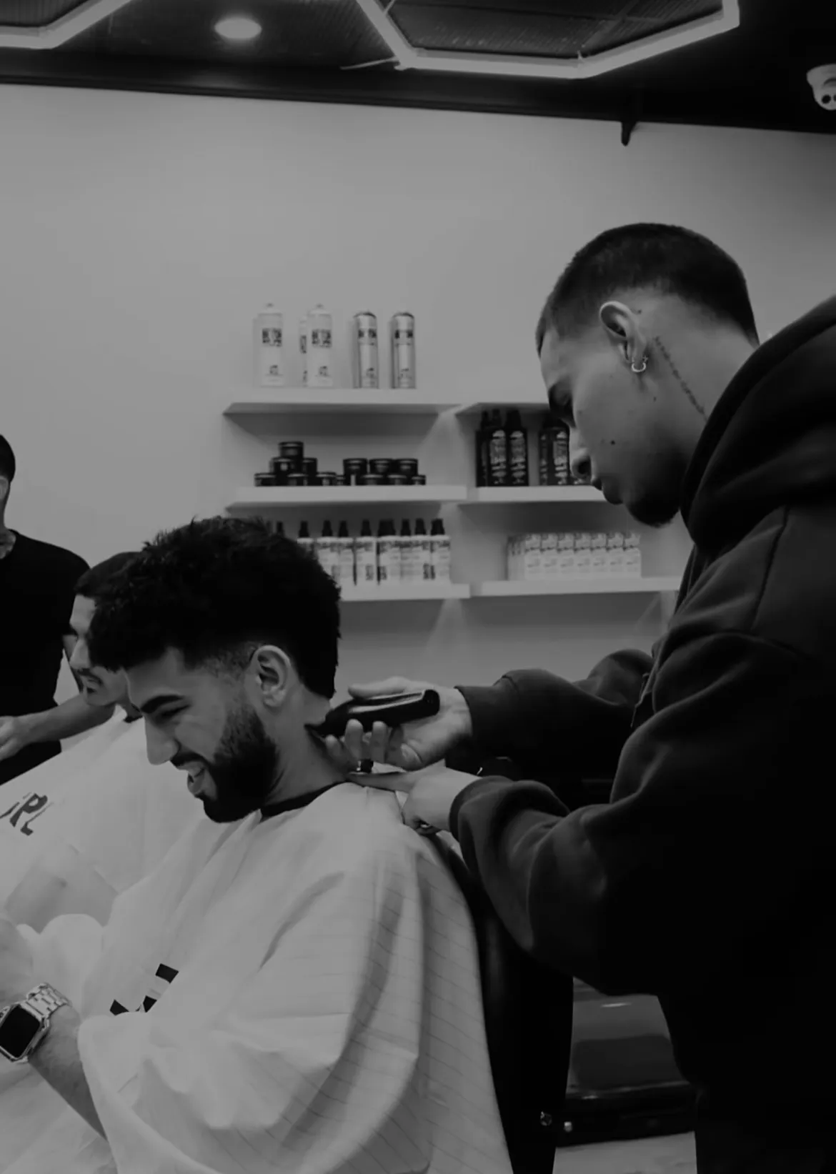 Dark luxury barber chair in black and white