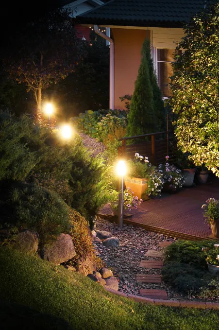 Landscape lighting in font of a home