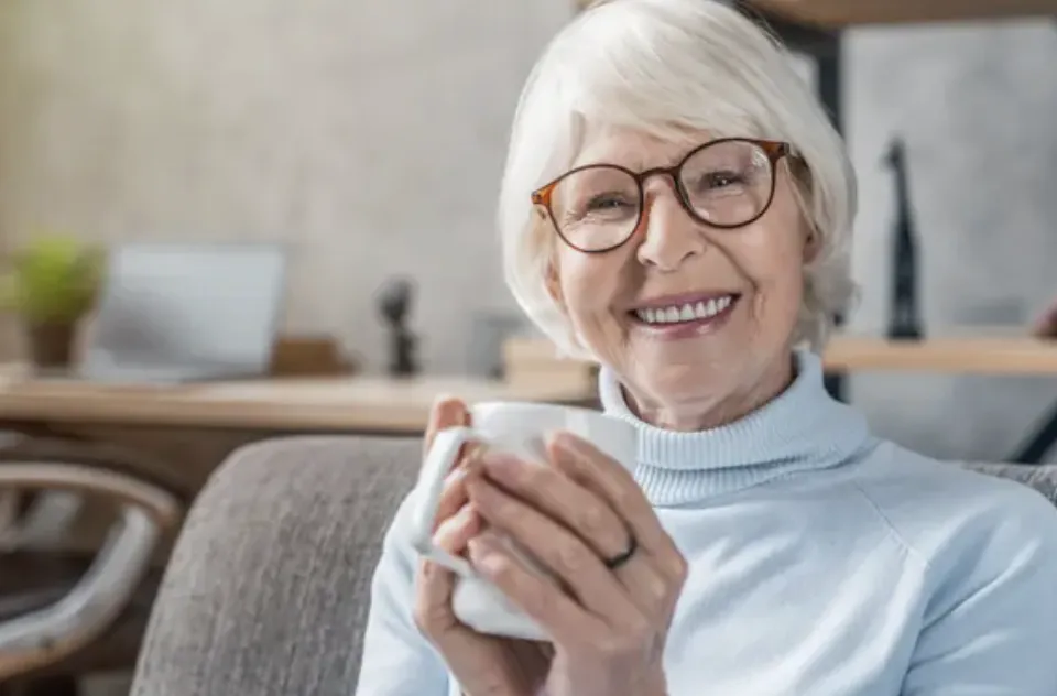 Traveling professional working at a desk in a shared home