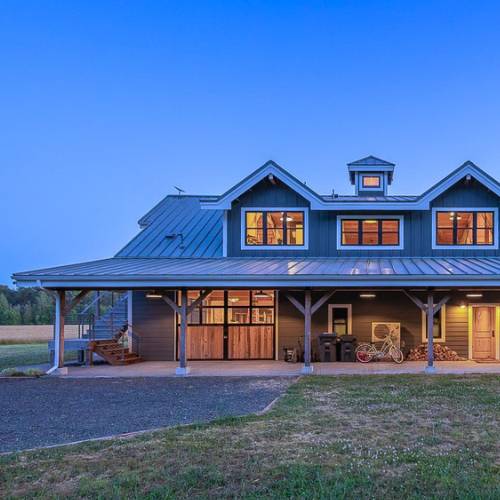 A new custom barndominium with gravel driveway, for barndominium construction in olathe kansas