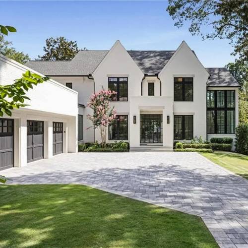 A new custom luxury construction in south olathe with 3 car garage