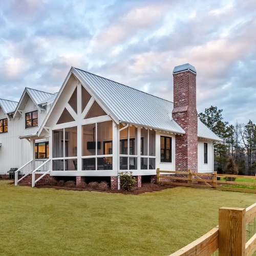 Exterior of modern farmhouse build on new lot with fence, for modern farmhouse builder in olathe kansas