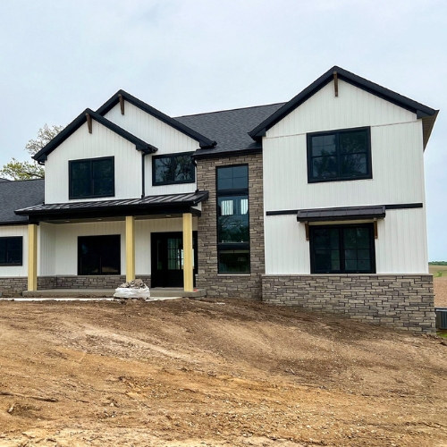 Modern farmhouse with large plot under construction, for modern farmhouse builder in olathe kansas