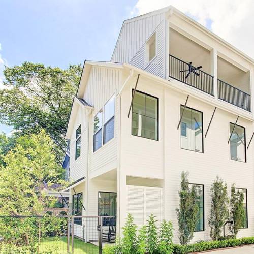 two story modern farmhouse with sun room, for modern farmhouse builder in olathe kansas