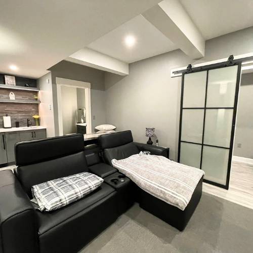 New basement design with carpet and sofas, for basement services lathe ks