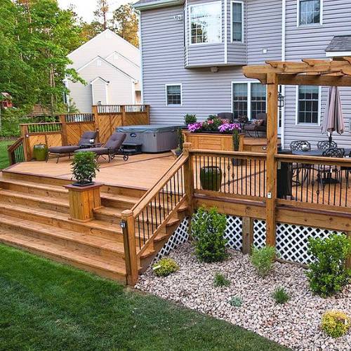 new custom deck next to rock garden, for custom deck building in olathe ks